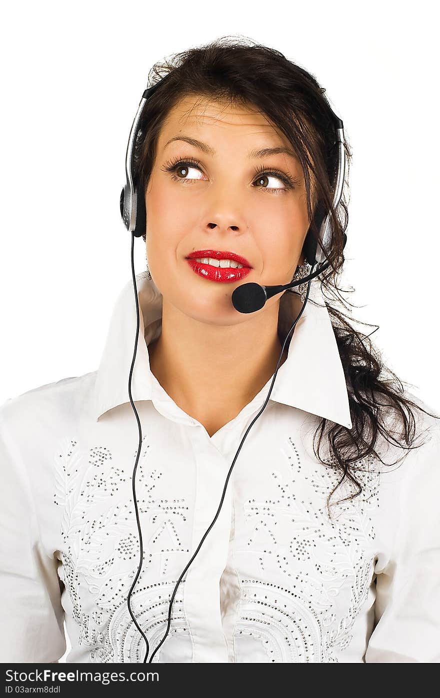 Portrait of female call centre wearing headset against white