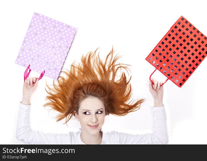 Girl with gift boxes. Studio shot. Girl with gift boxes. Studio shot.