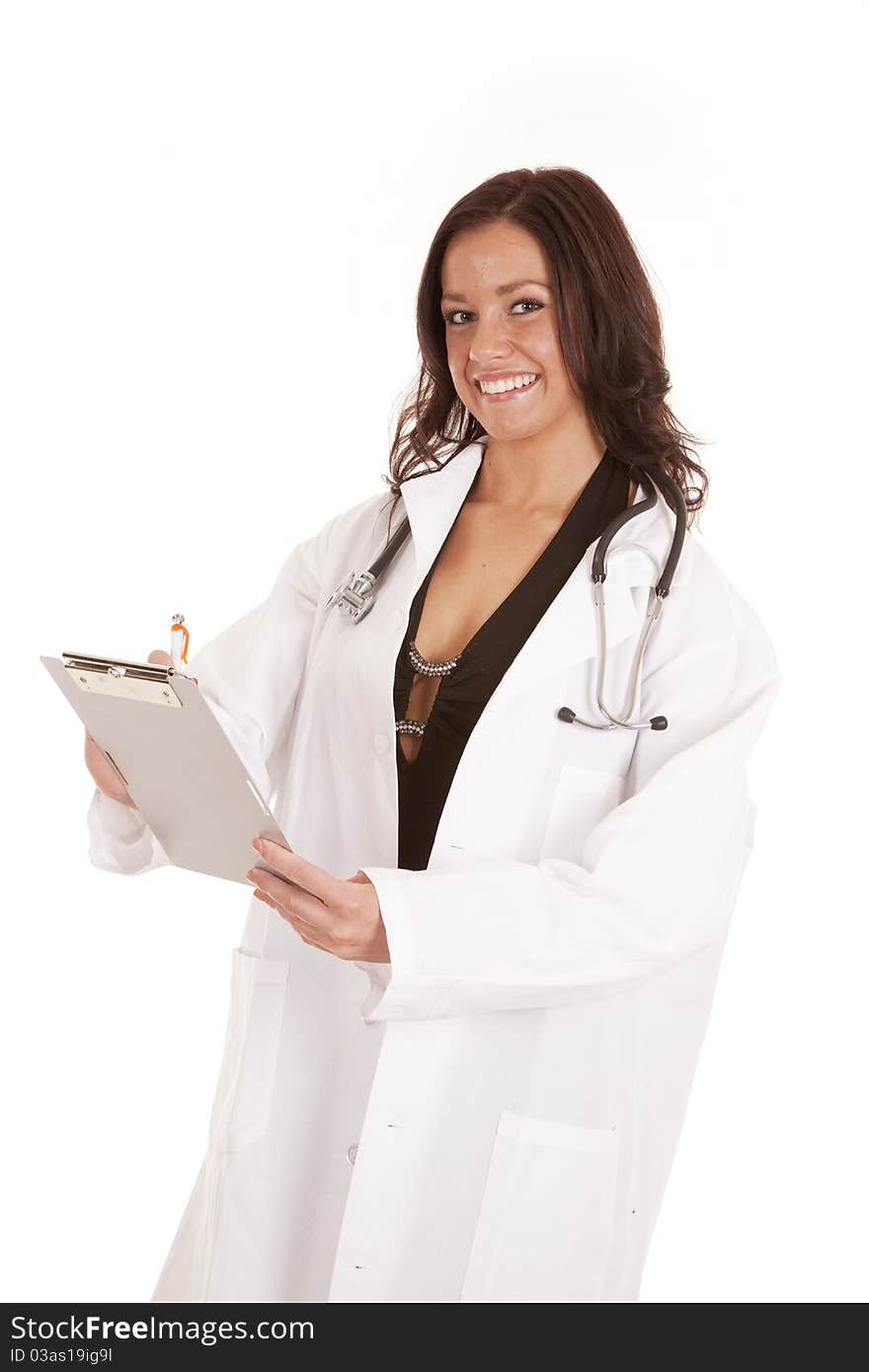 A woman doctor is standing with a clipboard and a smile. A woman doctor is standing with a clipboard and a smile.