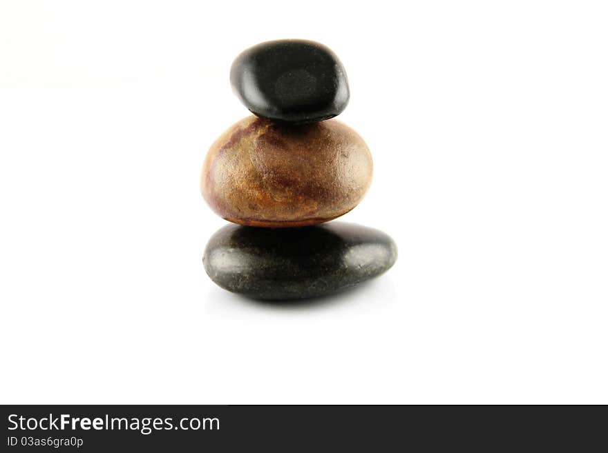 Stones stacked on top of each other isolated on a white background