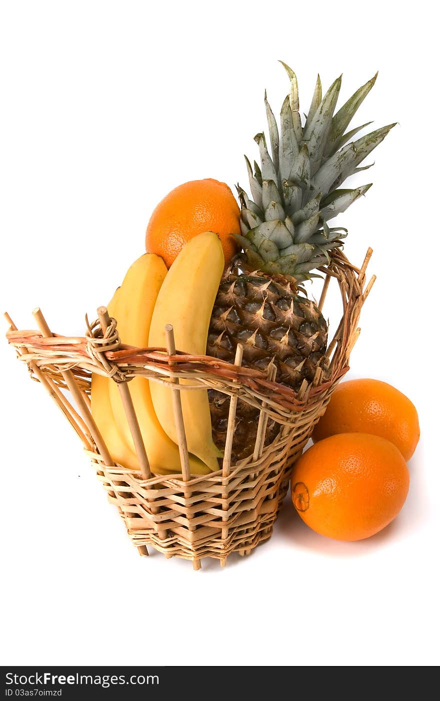 Basket with fruits on white background