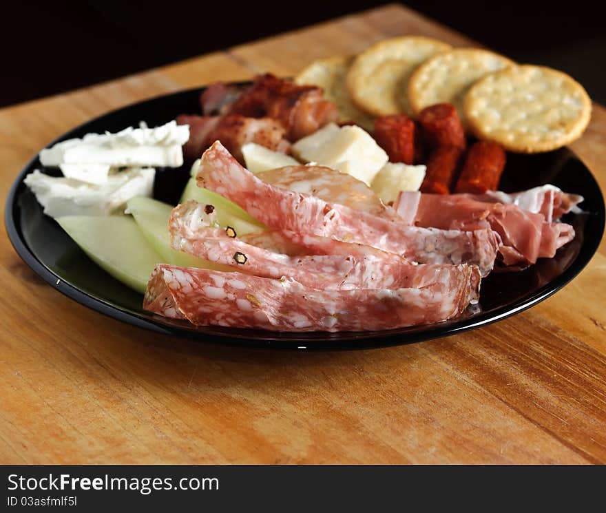 Closeup of salami on a buffet plate