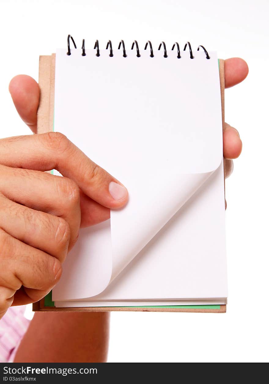 Hand showing a blank notebook with space in blank for insert text or design