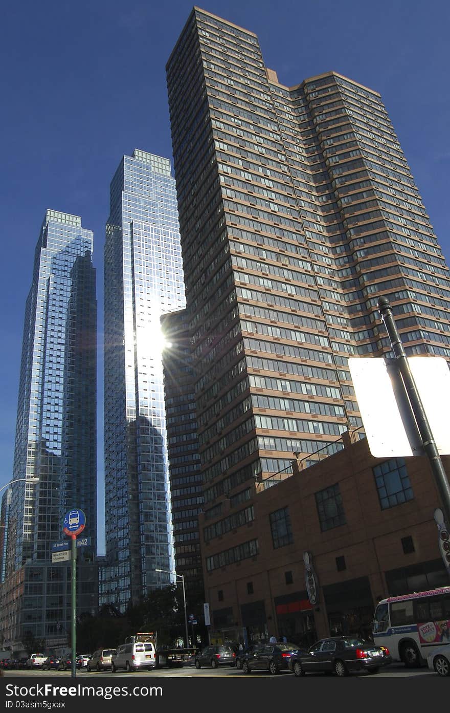 Tall executive buildings in New York City y the afternoon sun reflecting on them. Tall executive buildings in New York City y the afternoon sun reflecting on them