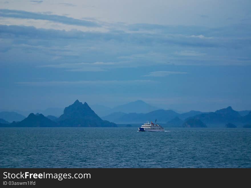 Ferry to samui in the sea mountain background