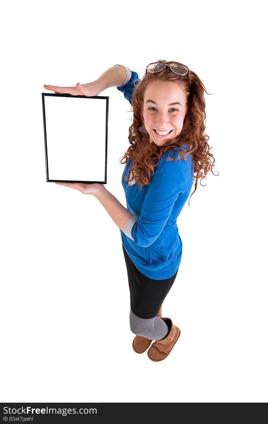 Beautiful teen girl show a table on white background