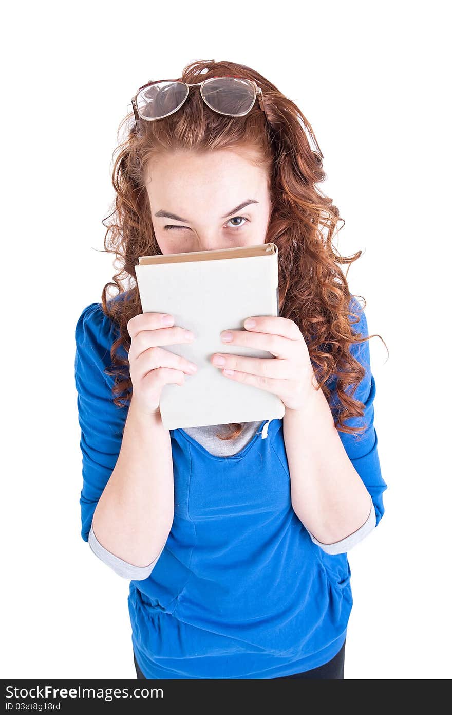 Beautiful teen girl with books on white background