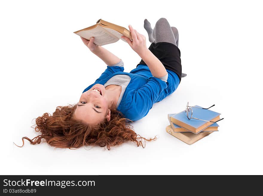 Beautiful teen girl with books on white background