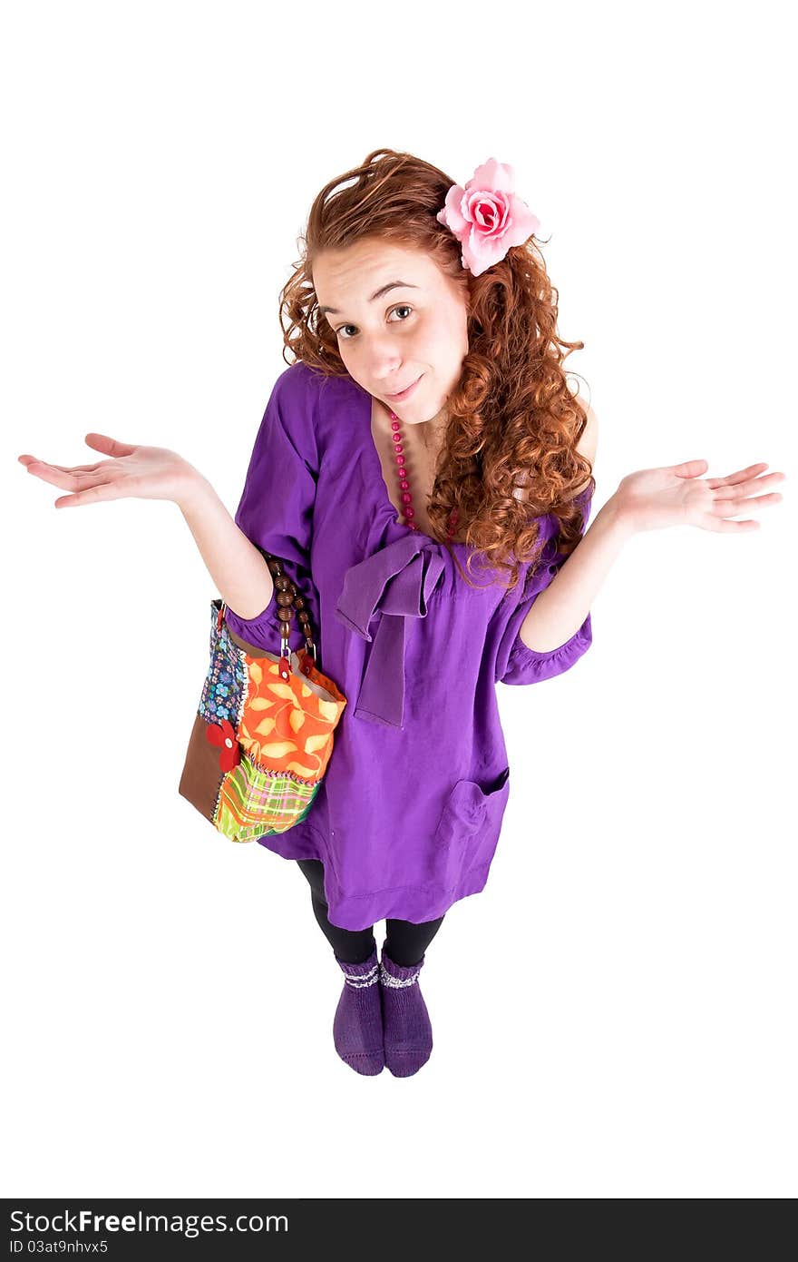 Beautiful teen girl with a little bag on white background