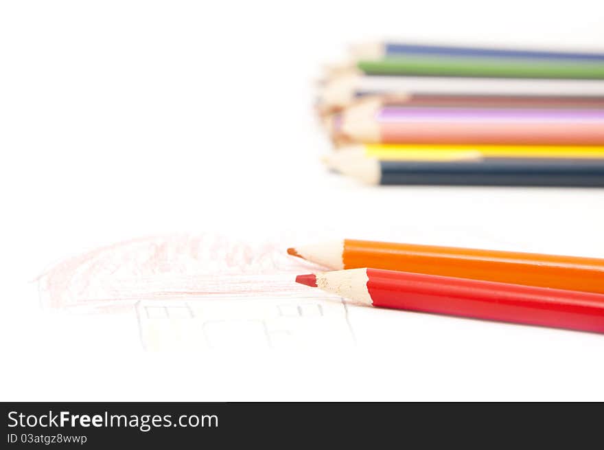 Children drawing with colored pencils