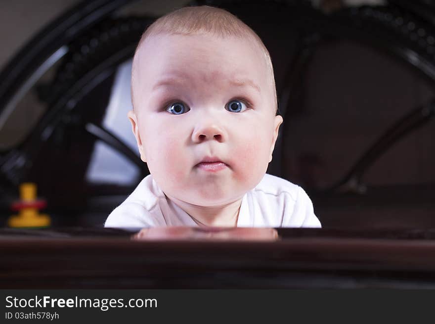 Baby crawling on the big bed. Baby crawling on the big bed.