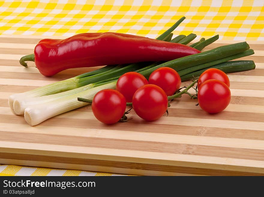 Green onion, tomatoes and red pepper