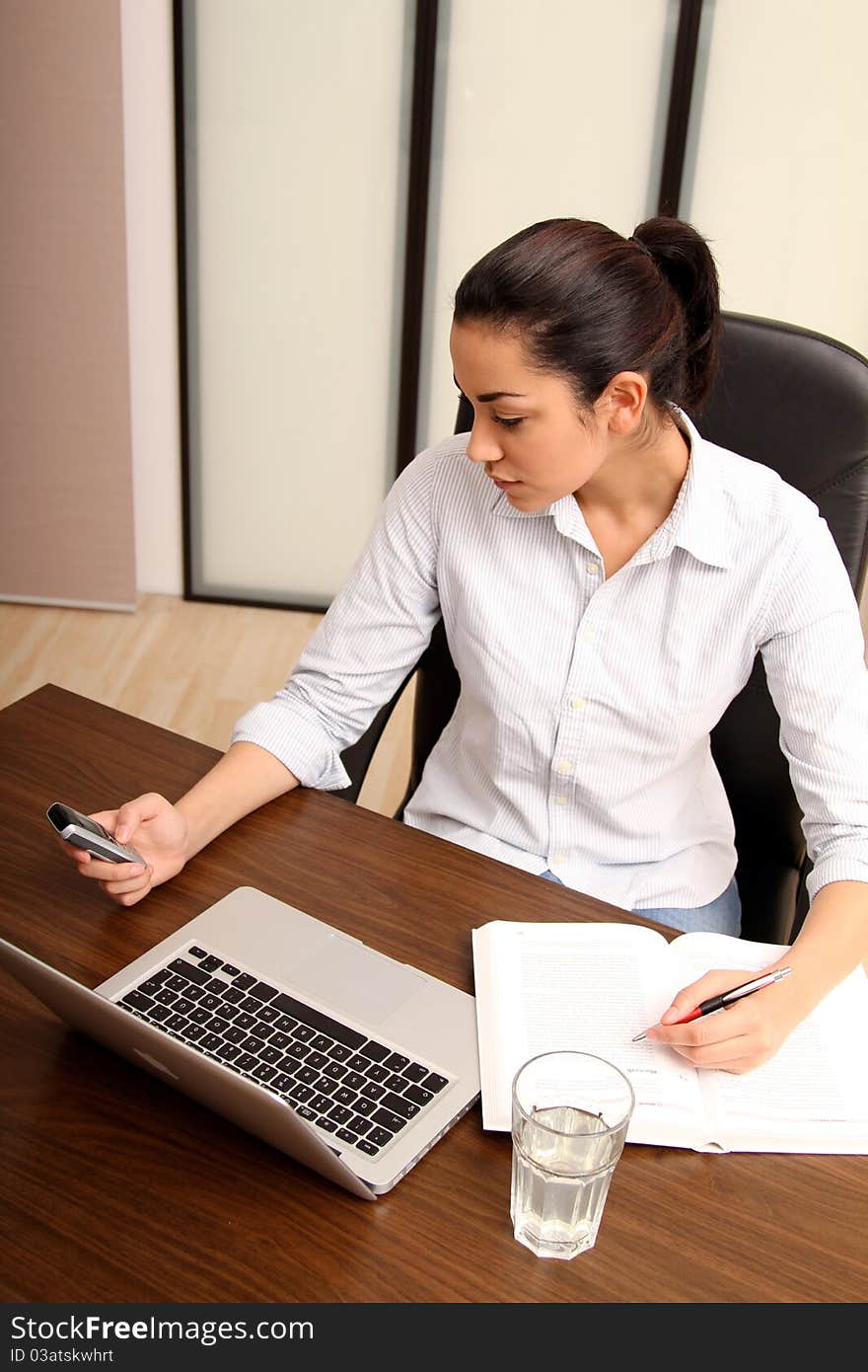 Young Woman Working In An Office