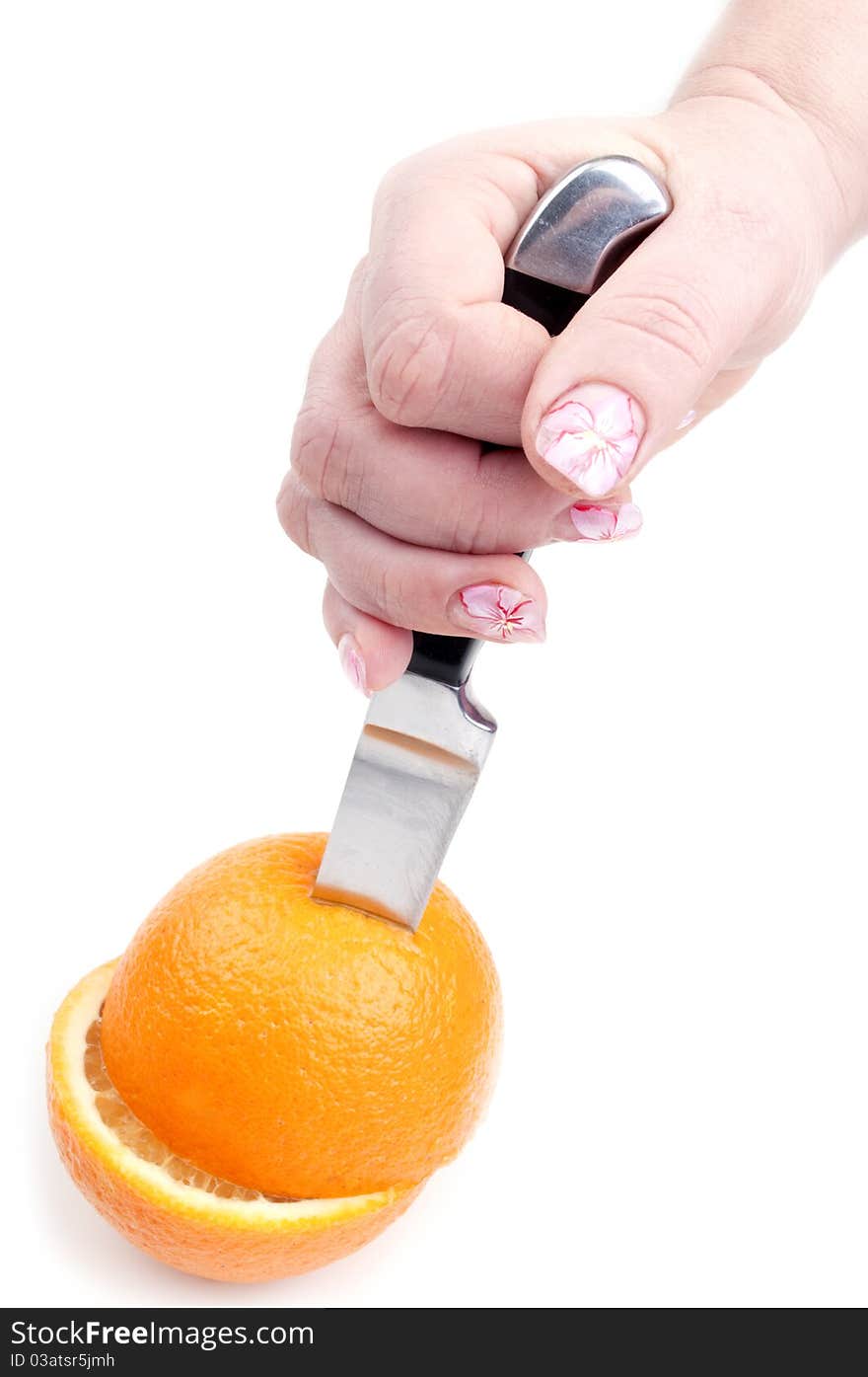 Knife and orange on a white background