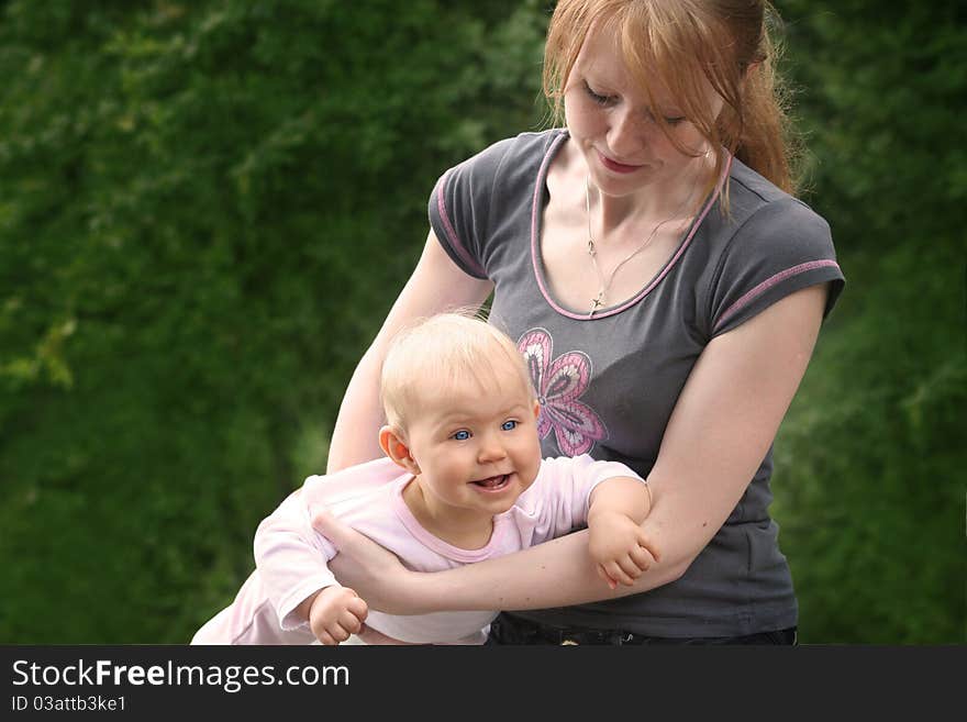 Mother and child playing outdoor