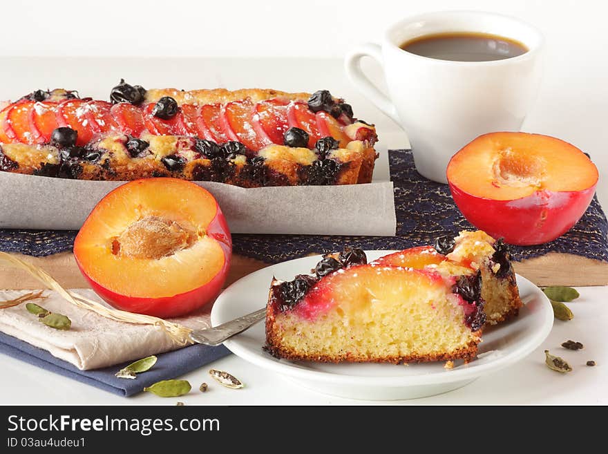 Fruitcake and cup of coffee.