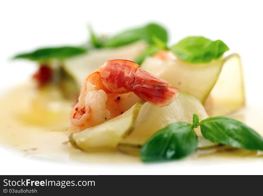 Studio close-up photography of a fried shrimp in a pear tree and decorated with sweet sauce mint leaves