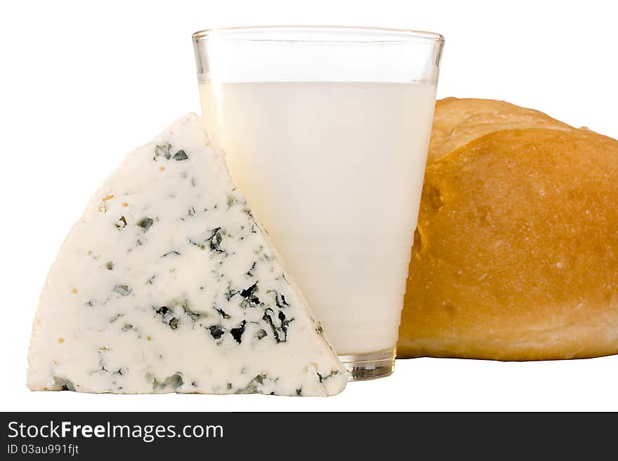 Slice of the Danish blue cheese with a milk.