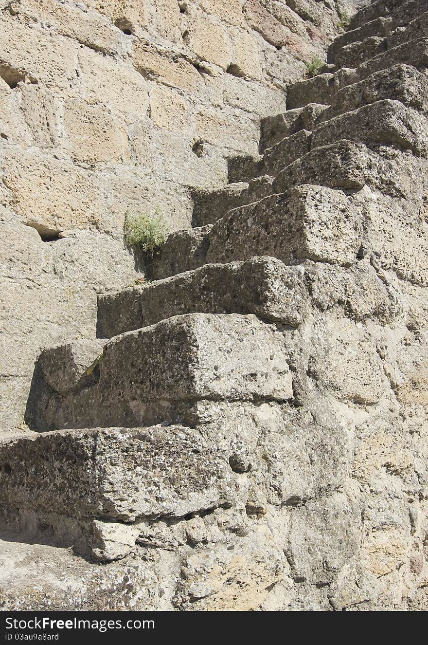 Stone ladder on an old medieval wall. Stone ladder on an old medieval wall