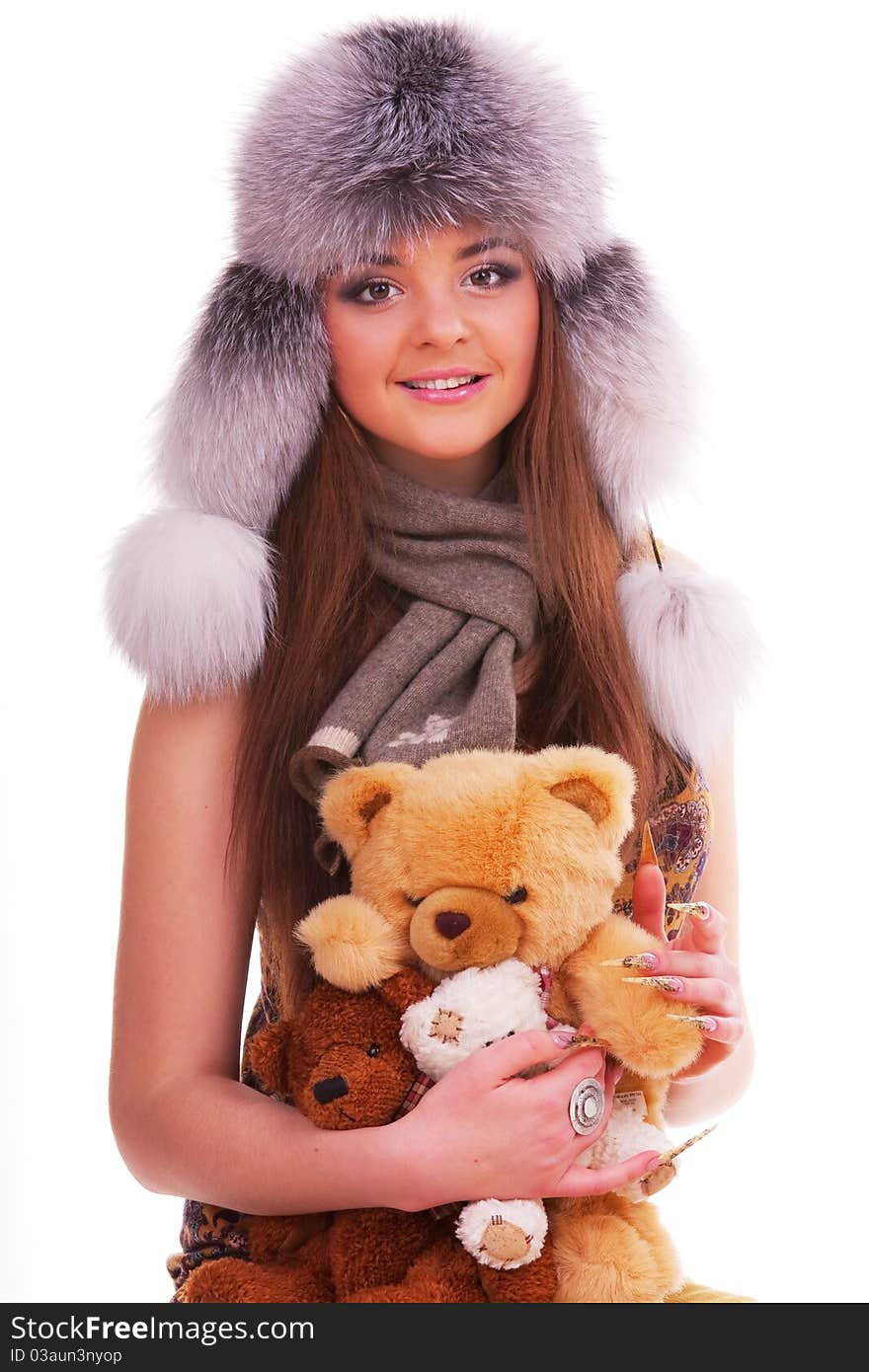 Beautiful longhair girl is holding the teddy bears. Beautiful longhair girl is holding the teddy bears