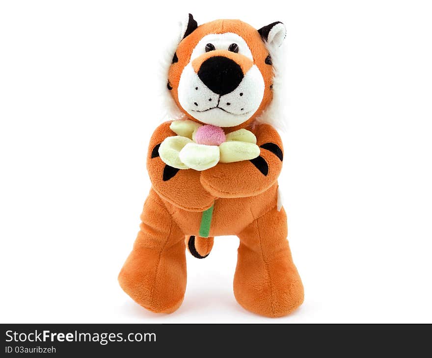 An orange toy tiger on a white background