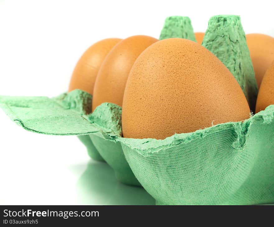 Easter Eggs in a basket isolated with white background