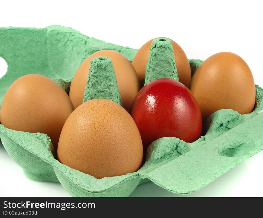 Easter Eggs in a basket isolated with white background