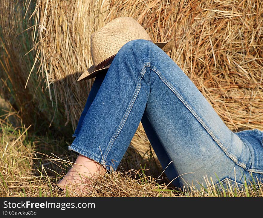 Legs with jeans in the field