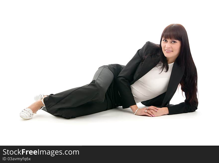 Businesswoman in suit lies, on white background.