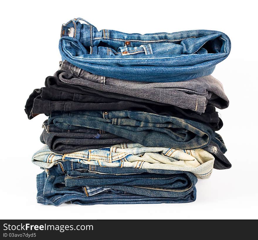 Stack of various jeans