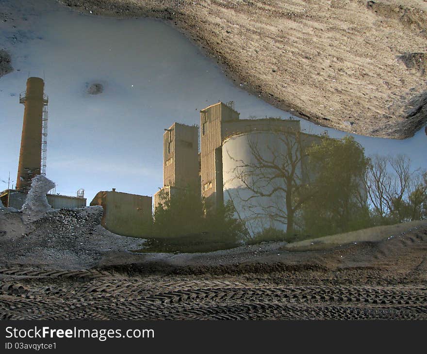 Reflection of industrial buildings in water. Reflection of industrial buildings in water