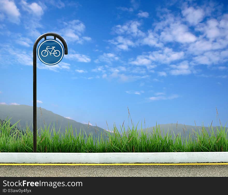 Bicycle sign and roadside landscape