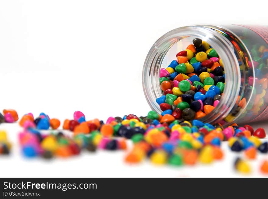 Decorative colorful cake or cookie sprinkles in a jar. Decorative colorful cake or cookie sprinkles in a jar