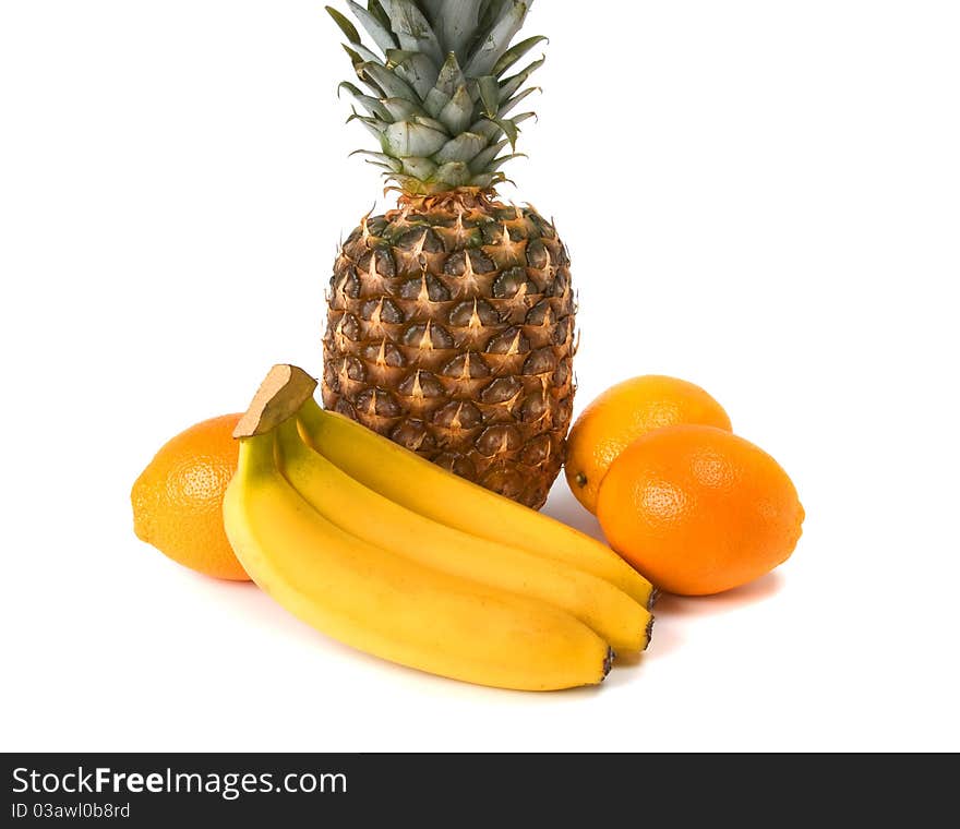 Pineapple, banana and orange on white background. Pineapple, banana and orange on white background