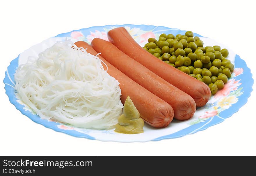 Dish with sausage, noodles and green peas. Dish with sausage, noodles and green peas