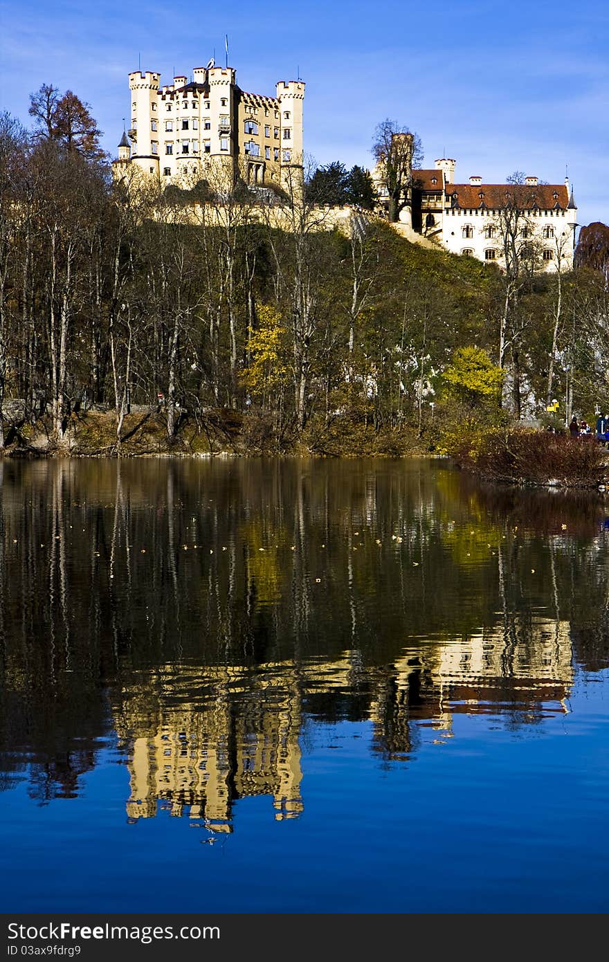 Hohenschwangau castle in Bavaria, Germany and the lake in front of it. Hohenschwangau castle in Bavaria, Germany and the lake in front of it