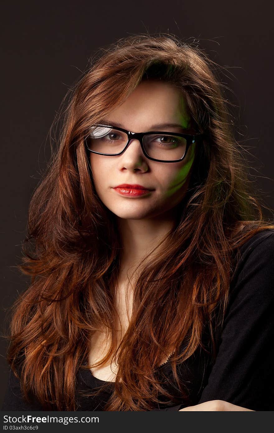 Photo of girl with glasses in studio. Photo of girl with glasses in studio