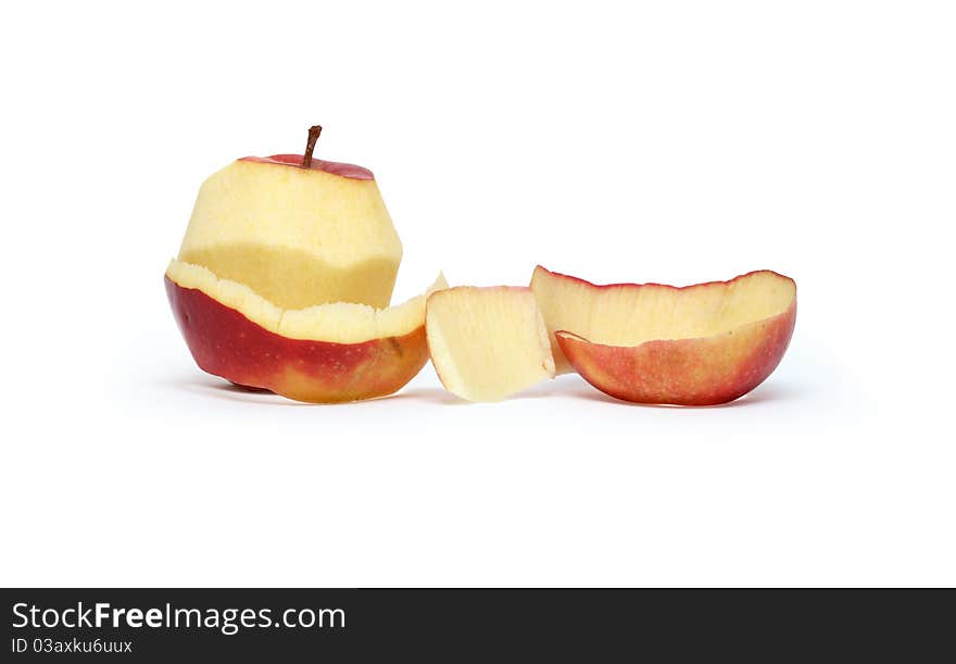 Apple peeled with twisting skin against white background. Clipping path is included. Apple peeled with twisting skin against white background. Clipping path is included