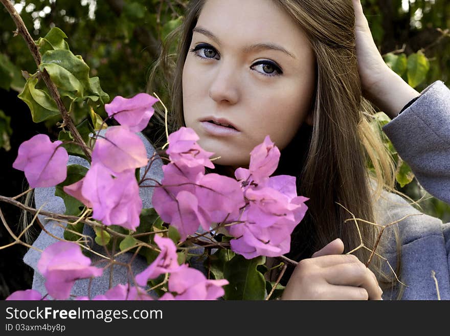 Beautiful woman poses on a fashion style