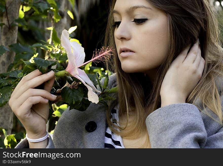 Beautiful woman poses on a fashion style