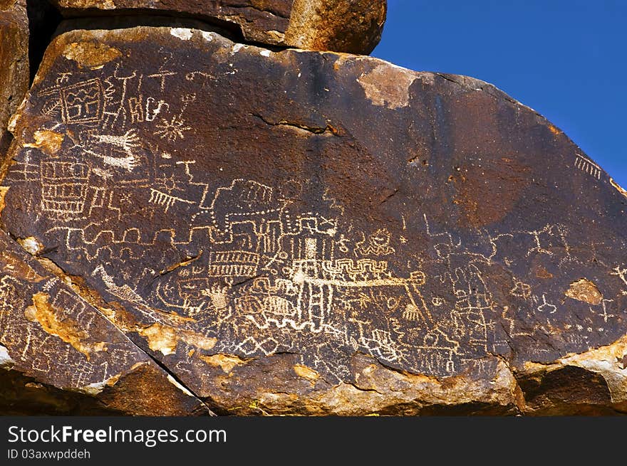 Written thousands of year ago these ancient petroglyphs can be found in Grapevine Valley, Arizona. Written thousands of year ago these ancient petroglyphs can be found in Grapevine Valley, Arizona.