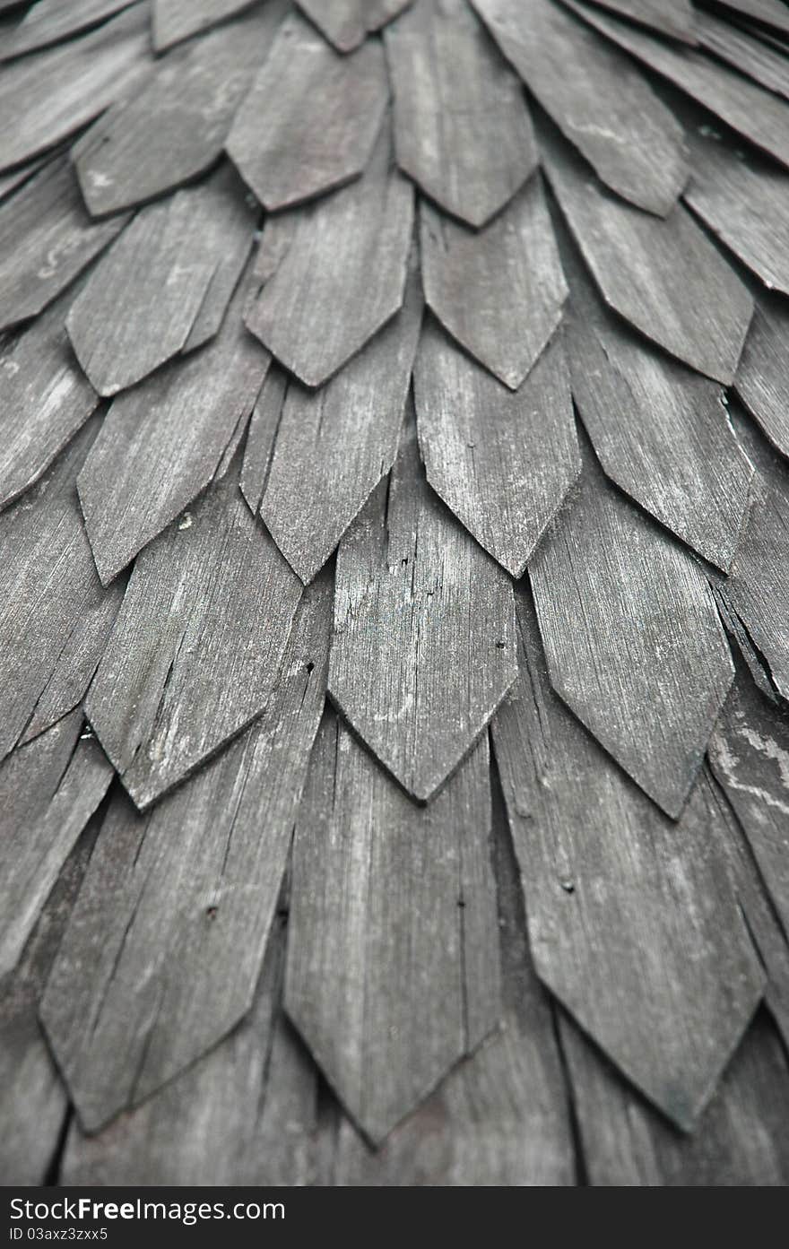 Aged wood tiles roof of an old javanese house. Aged wood tiles roof of an old javanese house