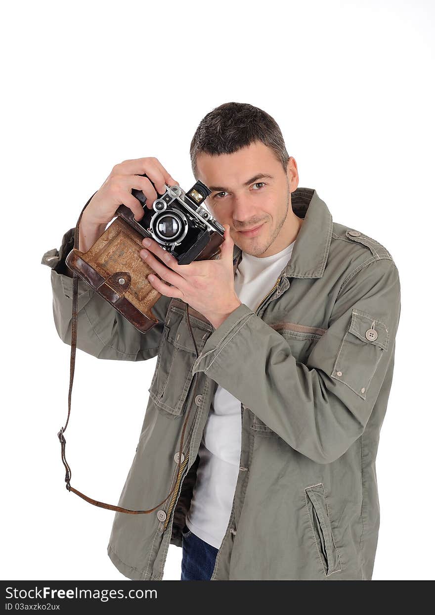 Young professional photographer with old retro film camera. isolated on white background. Young professional photographer with old retro film camera. isolated on white background