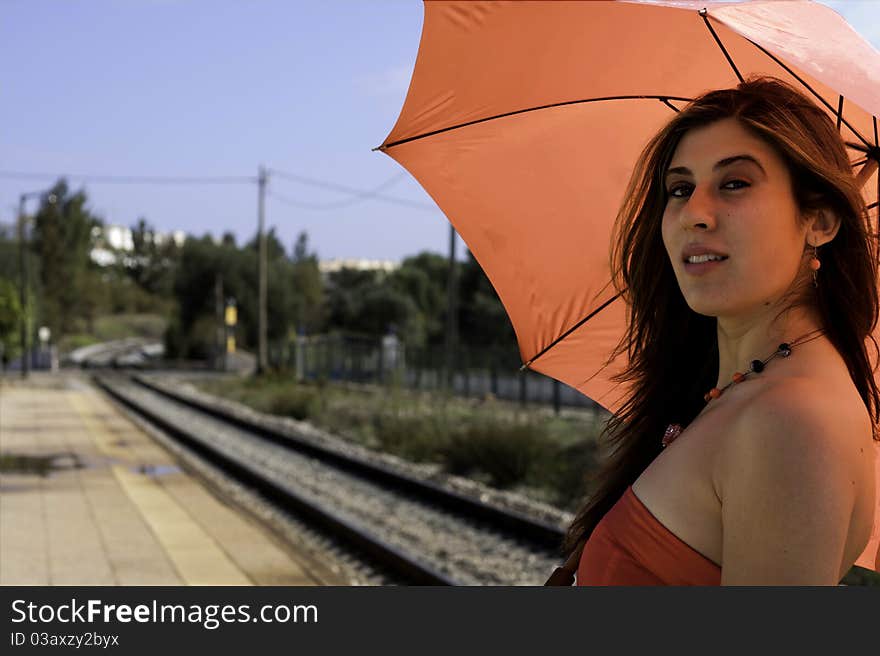 Beautiful woman with umbrella