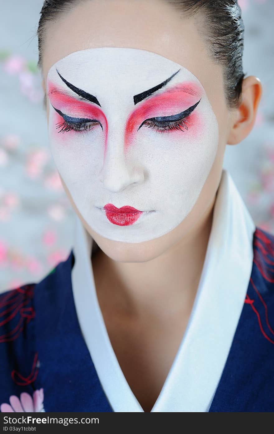 Japan geisha woman with creative make-up.close-up artistic portrait