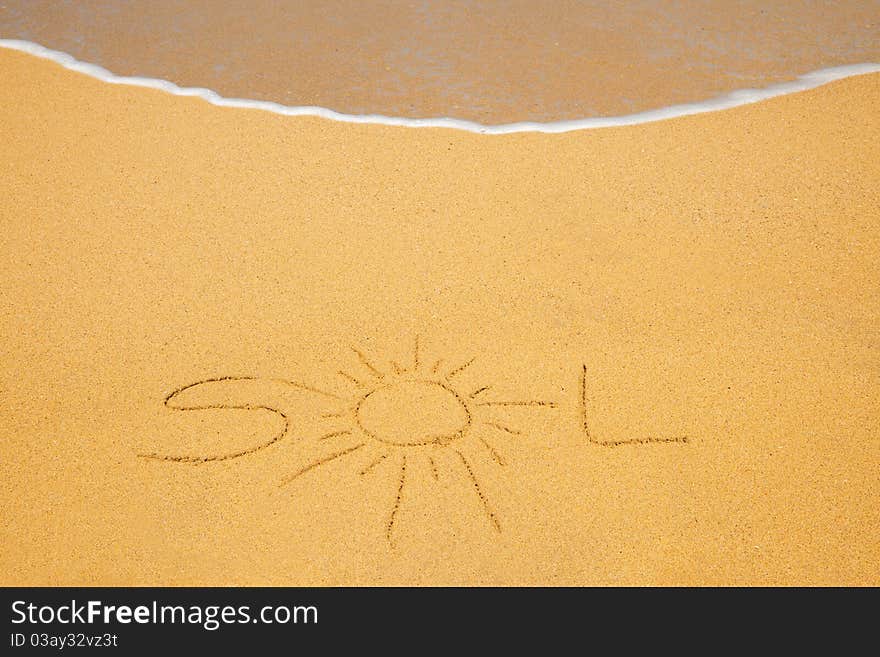 The Word Sol Written On Beach Sand With Wave