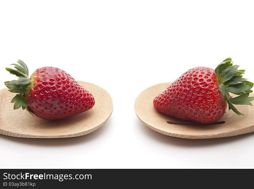 Strawberry put onto cook spoons