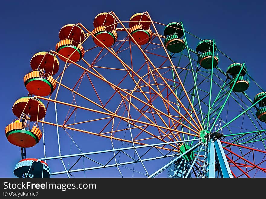 Ferris Wheel on a blue sky