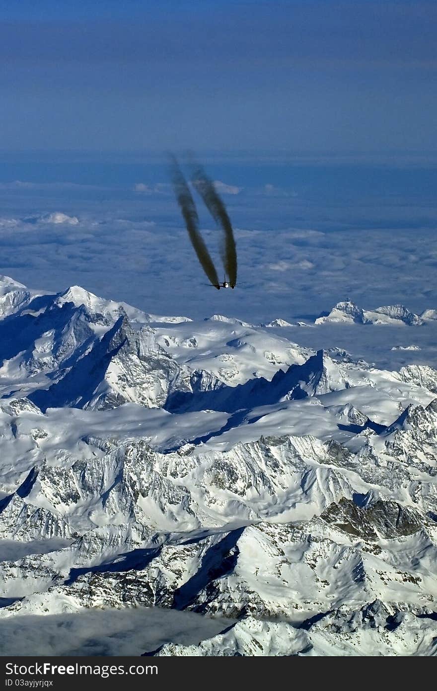 Aircraft in flight over the mountains