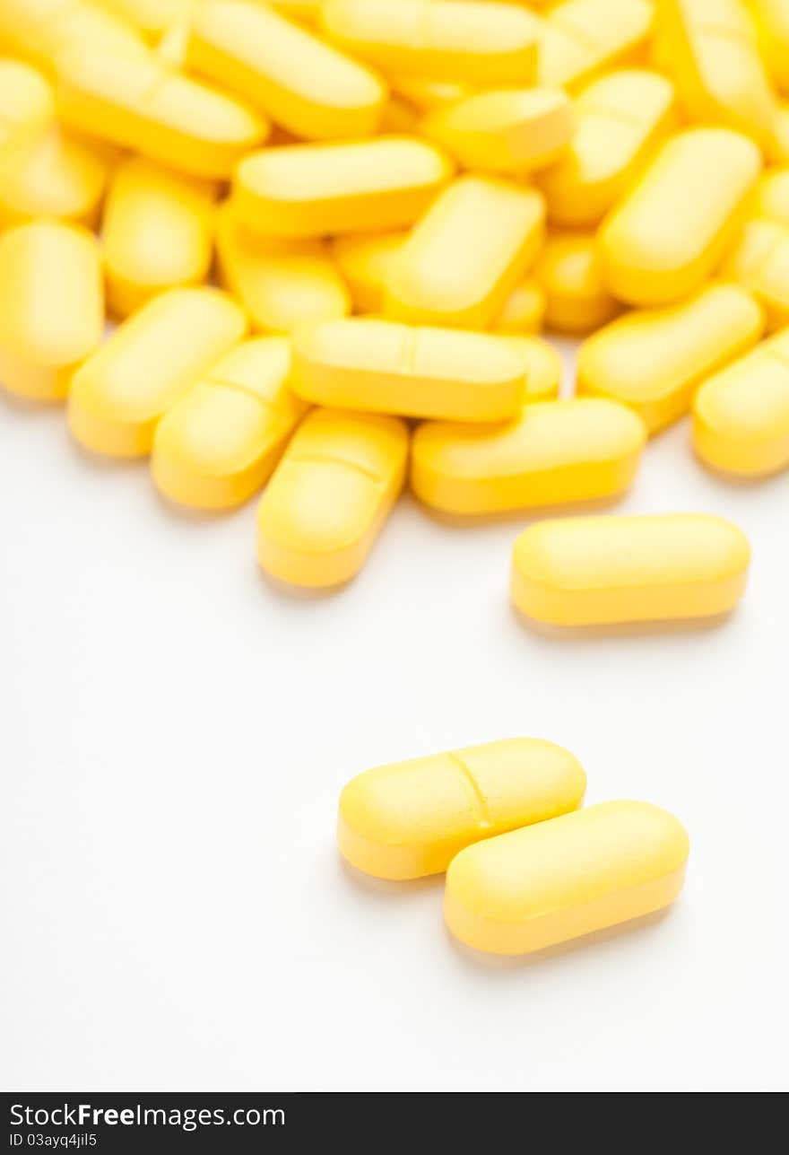 Medicinal pills piled up a bunch of closeup